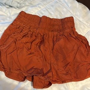 Like new Free People Movement The Way Home Shorts in burnt orange